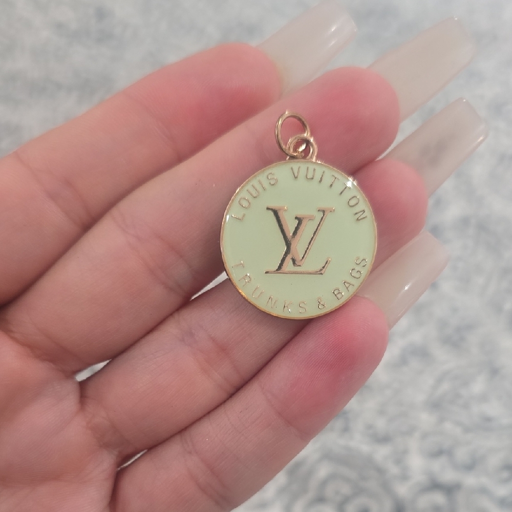 Louis Vuitton Ivory and Gold Charm